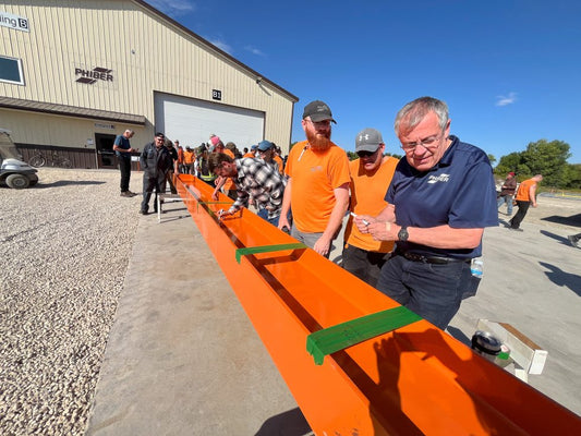 PhiBer Team Marks Milestone with Beam Signing Ceremony for New Facility Expansion
