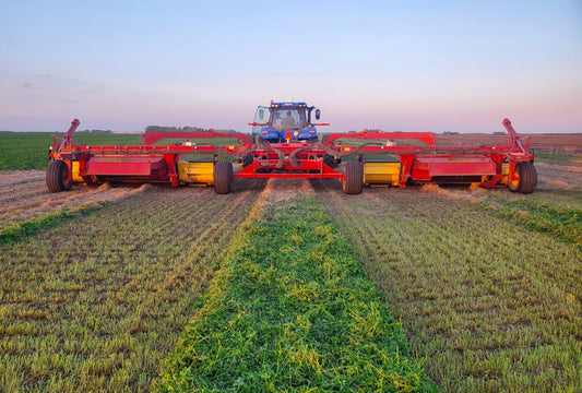 Canadian-made triple cutter cuts big hay swath